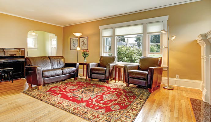 A clean oriental rug on the floor of living room